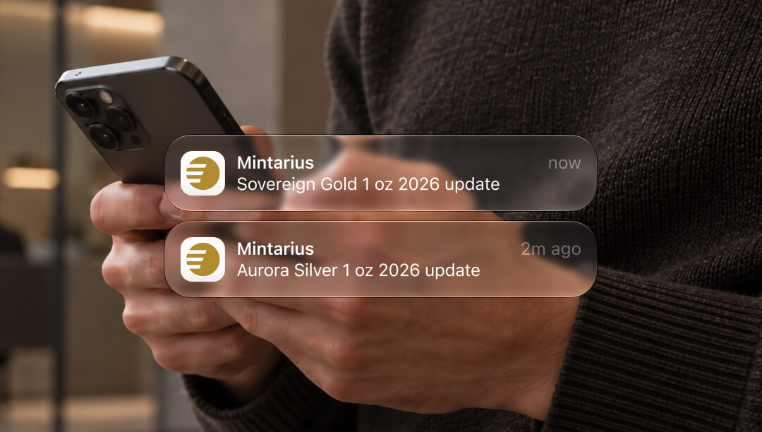 Two Mintarius product update notifications displayed over a photo of a person holding an iPhone